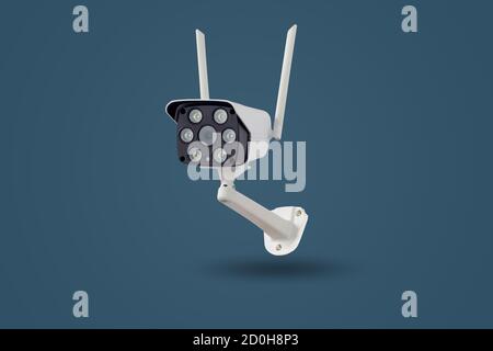 Waterproof outdoors wireless CCTV camera isolated on pastel colors background. Stock Photo