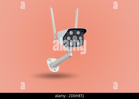 Waterproof outdoors wireless CCTV camera isolated on pastel colors background. Stock Photo