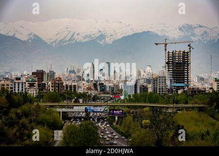 Tehran, Iran - 2019-04-16 - City skyline as seen from the Nature Bridge. Stock Photo