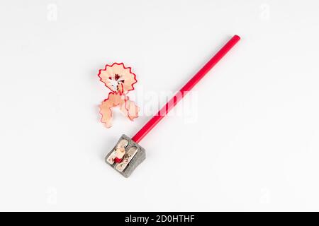 Concept art- Peeling pencil sharpener on white background Stock Photo