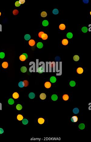 Multicolored abstract bokeh on black background Stock Photo