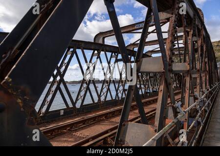 Barmouth railway bridge over the Mawddach estuary on the Wales coast Stock Photo