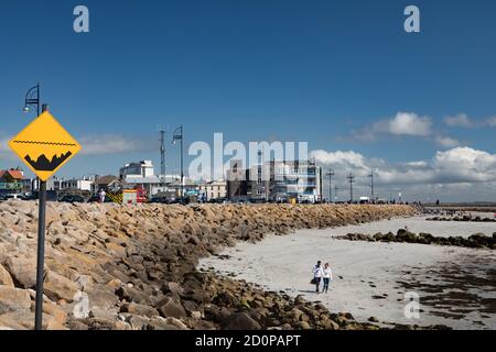 GALWAY CITY, IRELAND - 5th May, 2018: Salthill promenade on the beach in Galway city on a sunny spring afternoon Stock Photo