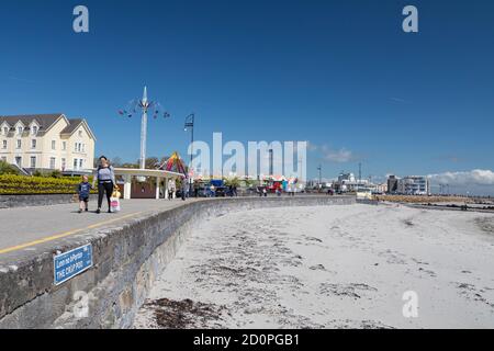 GALWAY CITY, IRELAND - 5th May, 2018: Salthill promenade on the beach in Galway city on a sunny spring afternoon Stock Photo