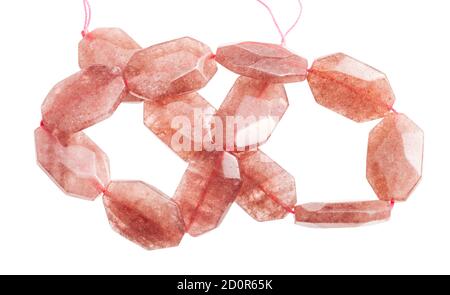 tangled string from faceted pink aventurine beads isolated on white background Stock Photo