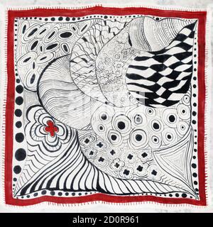 textile background - gray silk scarf with hand-drawn abstract picture Stock Photo