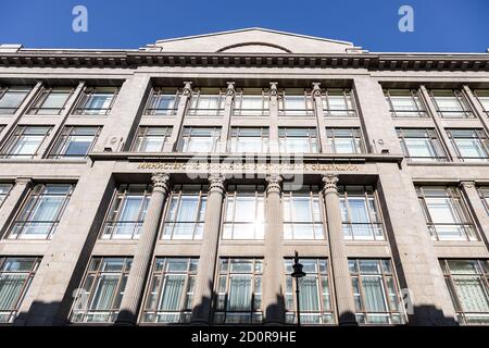 Facade of building of Ministry of Finance of the Russian Federation lit by sun in Moscow city. Translation of the inscription on the facade - 'Ministr Stock Photo