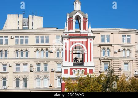 bell tower with ringer of Church of St George the Victorious (Church of the Holy Great Martyr George) on Pskov Mountain on Varvarka street Stock Photo