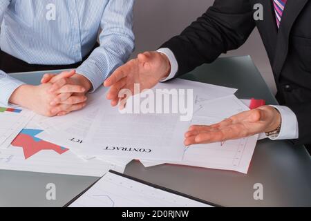 Business people working with statistics documents. Stock Photo
