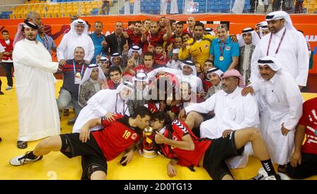 Qatar S Al Rayyan Players Celebrate After Winning The Gold Medal Match At The Asian Handball Club Championship Against Uae S Al Ahly In Doha November 15 2012 Reuters Mohammed Dabbous Qatar Tags Sport Handball