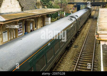 Diesel Train passing throgh the railway station in Bradford on Avon in Wiltshire. Stock Photo