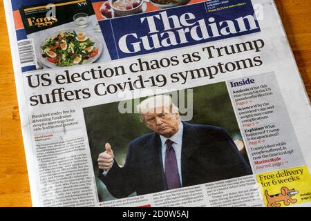 Headline on front page of The Guardian newspaper of 3 October 2020 says US election chaos as Trump suffers Covid-19 symptoms. Stock Photo