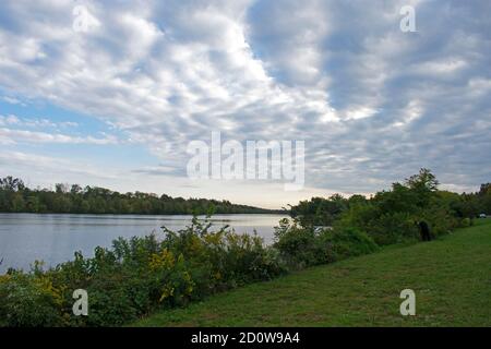 Reflections of cloudy skies at the Delaware and Raritan Canal State Park at Princeton, New Jersey, USA -03 Stock Photo