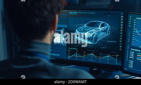 Professional Automotive Graphic Designer is Working on 3D CAD Software Rendering Electric Concept Car and Calculating its Efficiency in a High Tech Stock Photo