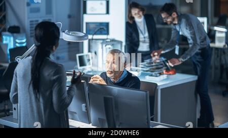 Diverse International Team of Industrial Engineers and Scientists Working in Research Laboratory Development Center. People Working on New Efficient Stock Photo
