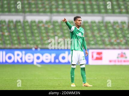 Bremen, Germany. 03rd Oct, 2020. Football: Bundesliga, Werder Bremen - Arminia Bielefeld, 3rd matchday. Werder's Theodor Gebre Selassie gestures during the match. Credit: Carmen Jaspersen/dpa - IMPORTANT NOTE: In accordance with the regulations of the DFL Deutsche Fußball Liga and the DFB Deutscher Fußball-Bund, it is prohibited to exploit or have exploited in the stadium and/or from the game taken photographs in the form of sequence images and/or video-like photo series./dpa/Alamy Live News Stock Photo