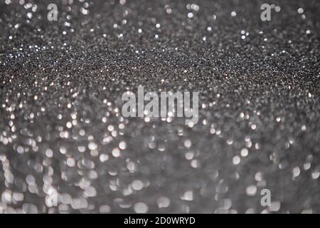 Silver glittering bokeh background New Year concept Stock Photo