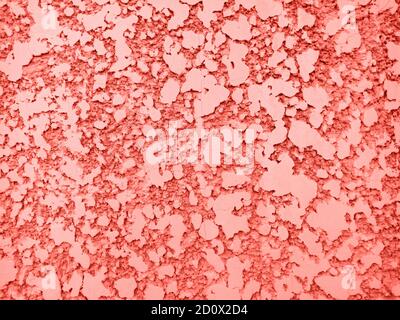 Trend photography on the theme of the actual colors for this season - a shade of orange. Light texture of the plaster background. Stock Photo