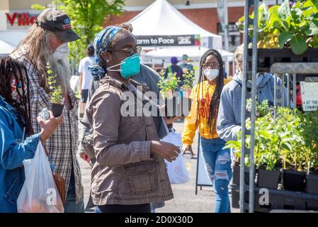 Shopping at the Waverly Market, Baltimore, Maryland Stock Photo