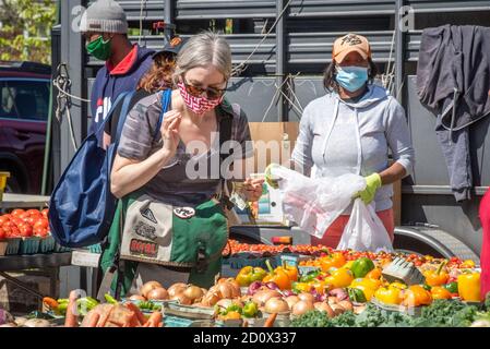 Shopping at the Waverly Market, Baltimore, Maryland Stock Photo