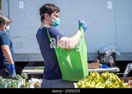 Shopping at the Waverly Market, Baltimore, Maryland Stock Photo