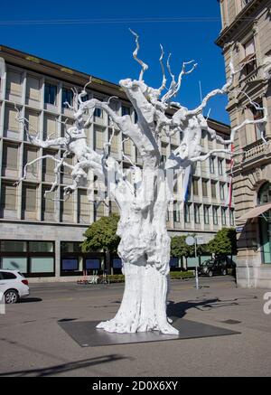 ZURICH, SWITZERLAND, JUL 30 2020, An artistic imitation of a white olive tree on Paradeplatz square, Zurich. Stock Photo