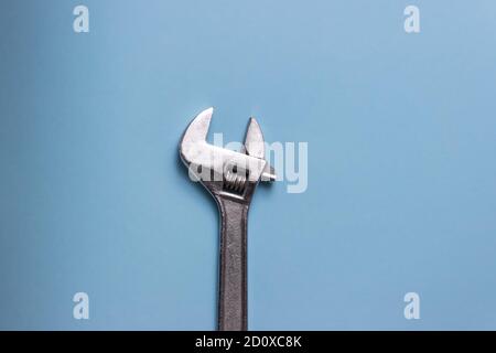 Minimalist photo of adjustable wrench with copy space Stock Photo