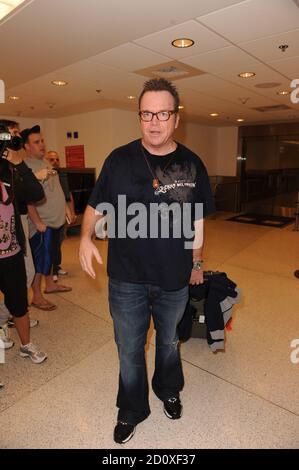 Miami, United States Of America. 03rd Feb, 2009. MIAMI, FL - FEBRUARY 3: Thomas Duane 'Tom' Arnold (born March 6, 1959) arrives at Miami International Airport . On February 3, 2010 in Miami, Florida. People: Tom Arnold Credit: Storms Media Group/Alamy Live News Stock Photo