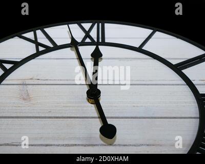 Old antique clock face and hands close-up detail. Stock Photo