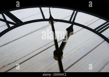 Old antique clock face and hands close-up detail. Stock Photo