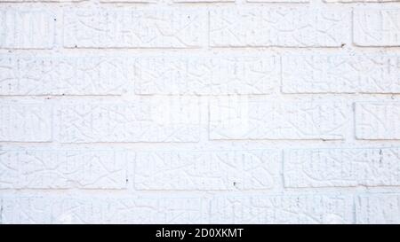 White Wall With Painted Bricks Stock Photo