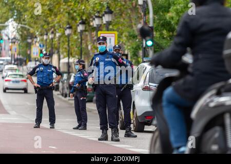 Madrid, Spain. 03rd Oct, 2020. Policemen at the checkpoint outside the Atocha, the main train station.Today is the first day of the confinement imposed in the Community of Madrid due to the increase in Covid 19 infections. Credit: SOPA Images Limited/Alamy Live News Stock Photo