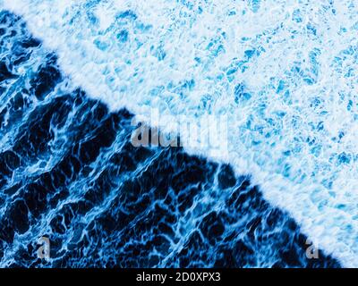 Arial view of splashing oceanic waves with bubbles and foam. Copy space. High quality photo Stock Photo