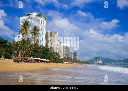 NHA TRANG, VIETNAM - DECEMBER 30, 2015: View of the coastline of modern Nha Trang on a sunny day Stock Photo