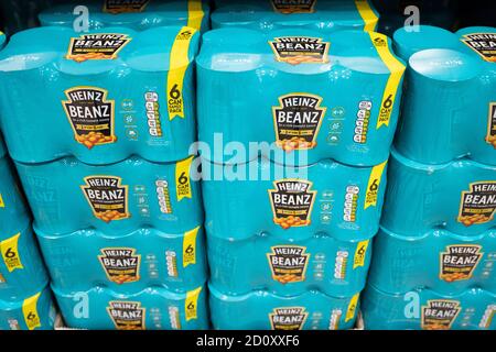 Packs of Heinz baked beans for sale in a supermarket in Cardiff, Wales, United Kingdom. Stock Photo