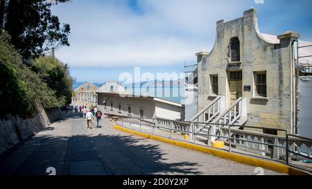 San Francisco, California, USA - August 2014: Alcatraz prison building with tourists visiting Stock Photo