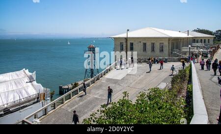 San Francisco, California, USA - August 2014: Alcatraz prison building with tourists visiting Stock Photo