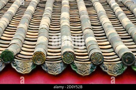 Old green clay tiles on a Chinese temple roof Stock Photo