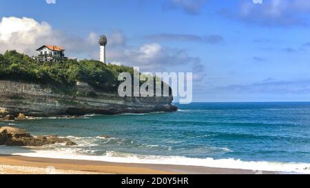 The Biarritz lighthouse marks the limit separating the sandy coast of the Landes from the rocky coast of the Basque Country. Stock Photo