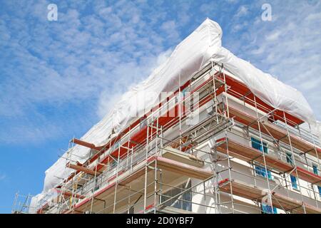 scaffolding on construction site of a residential building Stock Photo