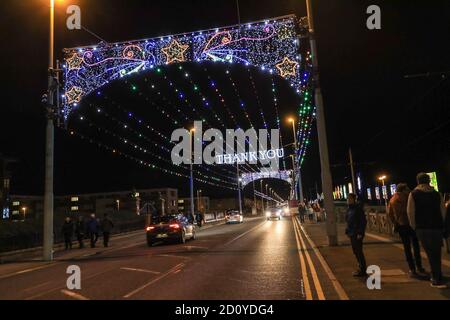 A donation collection point with 'thank you' in lights at Blackpool Illuminations, Blackpool, Lancashire, England, UK Stock Photo