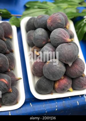 fresh fruit figs, unpeeled in the basket Stock Photo