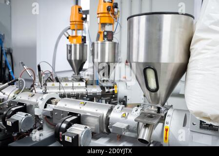 Extruder machine for extrusion of plastic material, close-up view Stock Photo