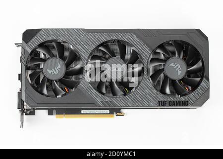 Kyiv, Ukraine - September 09.2020: Nvidia Geforse GTX 1660Ti Tuf Gaming and its card on white background. Nvidia is a leading company in the world of Stock Photo
