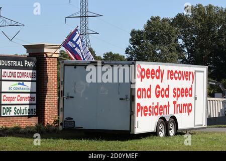 Dumfries. VA, USA. 3rd Oct, 2020. Trump supporters create trailer wishing Trump back to good health overnight after he tested positive for Coronavirus on October 3, 2020 in Dumfries, Virginia. Credit: Mpi34/Media Punch/Alamy Live News Stock Photo