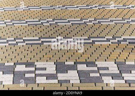 striped pattern of rectangular tiles in the park Stock Photo
