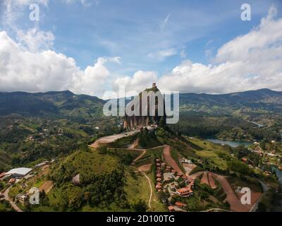 Drone shot of the Rock of Guatape, also called La Piedra or El Peñol. It is located in the town and municipality of Guatapé, Antioquia. 200 m high.