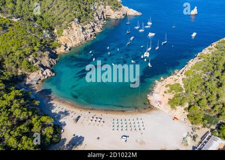 Picture dated July 30th shows the quiet beach at Cala Benirrás in ibiza on Thursday as the restrictions on visiting the Spanish Balearic Islands starts to take effect with very few new visitors arriving.  Earlier this week the Foreign Office extended its travel advice for Spain, now telling people to avoid non-essential journeys to the Canary and Balearic Islands, as well as mainland Spain.  But some travel agents say they are struggling to understand the logic of the UK government's advice, because the islands have lower coronavirus infection rates. Stock Photo