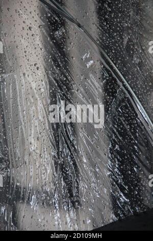 Photography image of drops of water on umbrella on rainy day in London Stock Photo