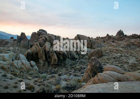 Alabama Hills is a beautiful desert location in Inyo County, CA, USA, perfect for camping and watching a sunset. Stock Photo